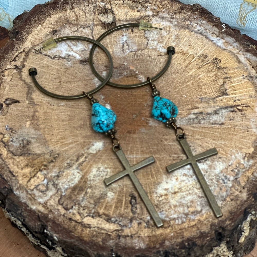 Lovely faux turquoise and cross earrings.